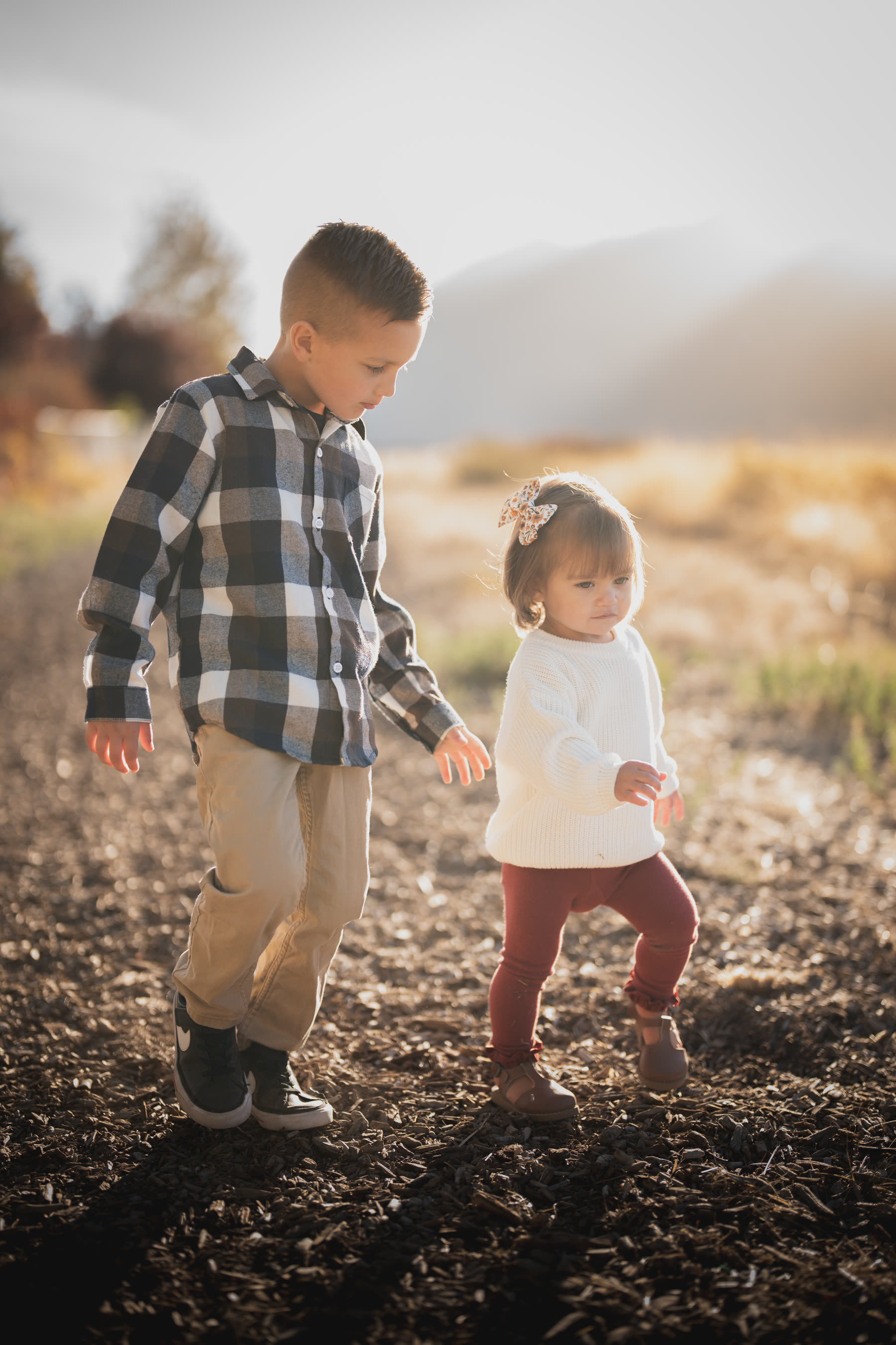 Children playing, golden hour