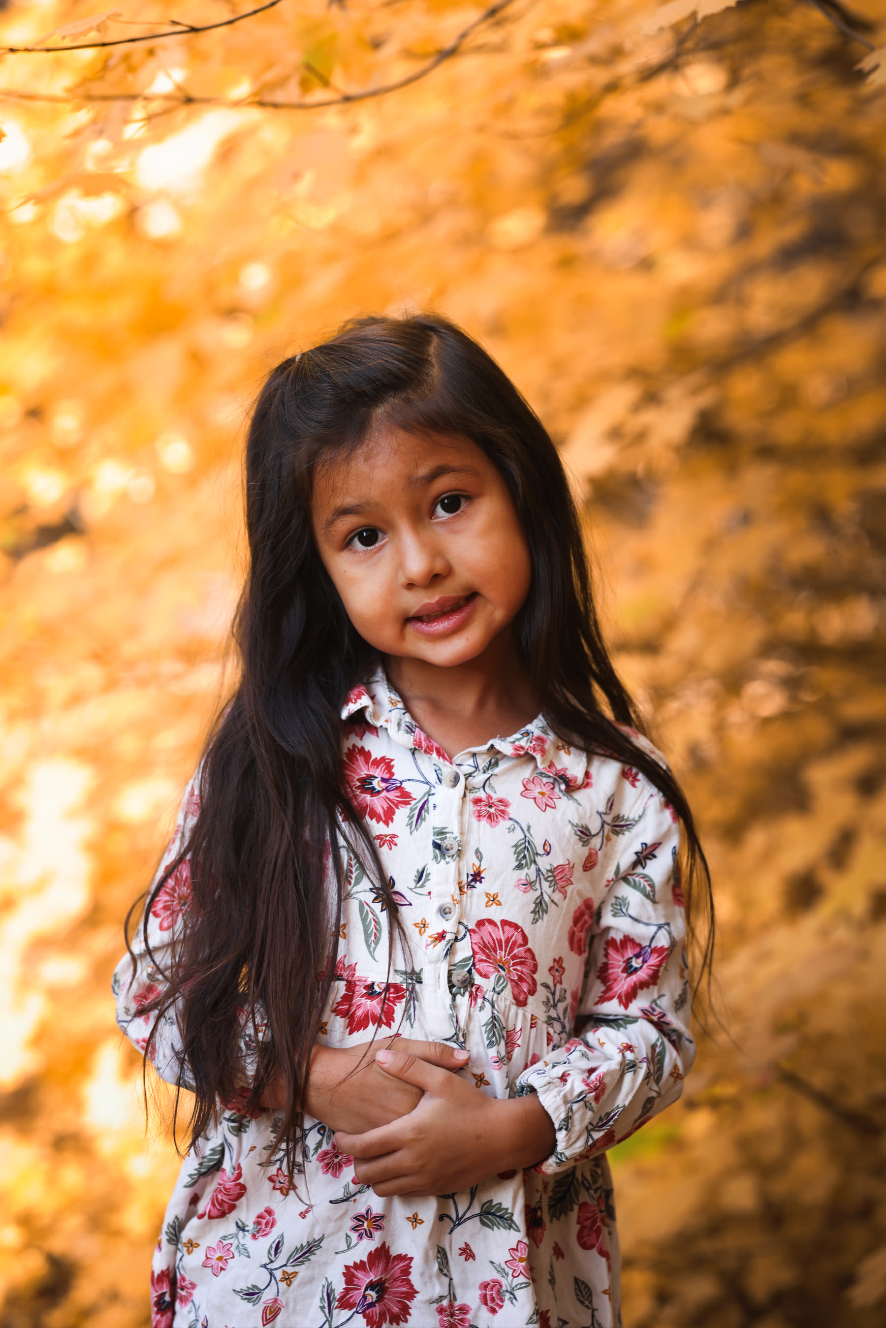 Child portrait, floral dress, golden light