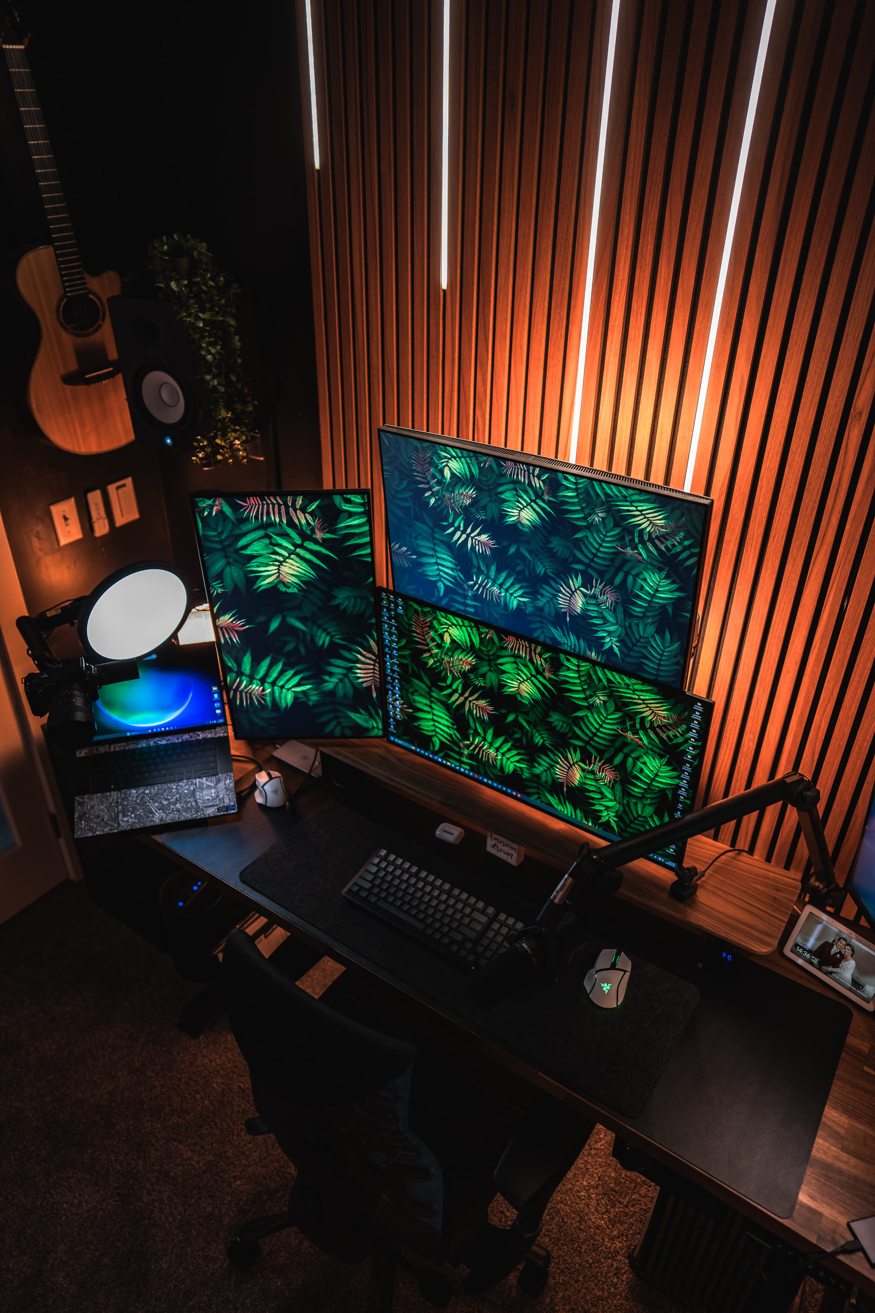 The Black Note in-house editing suite: color-calibrated monitors under warm studio light