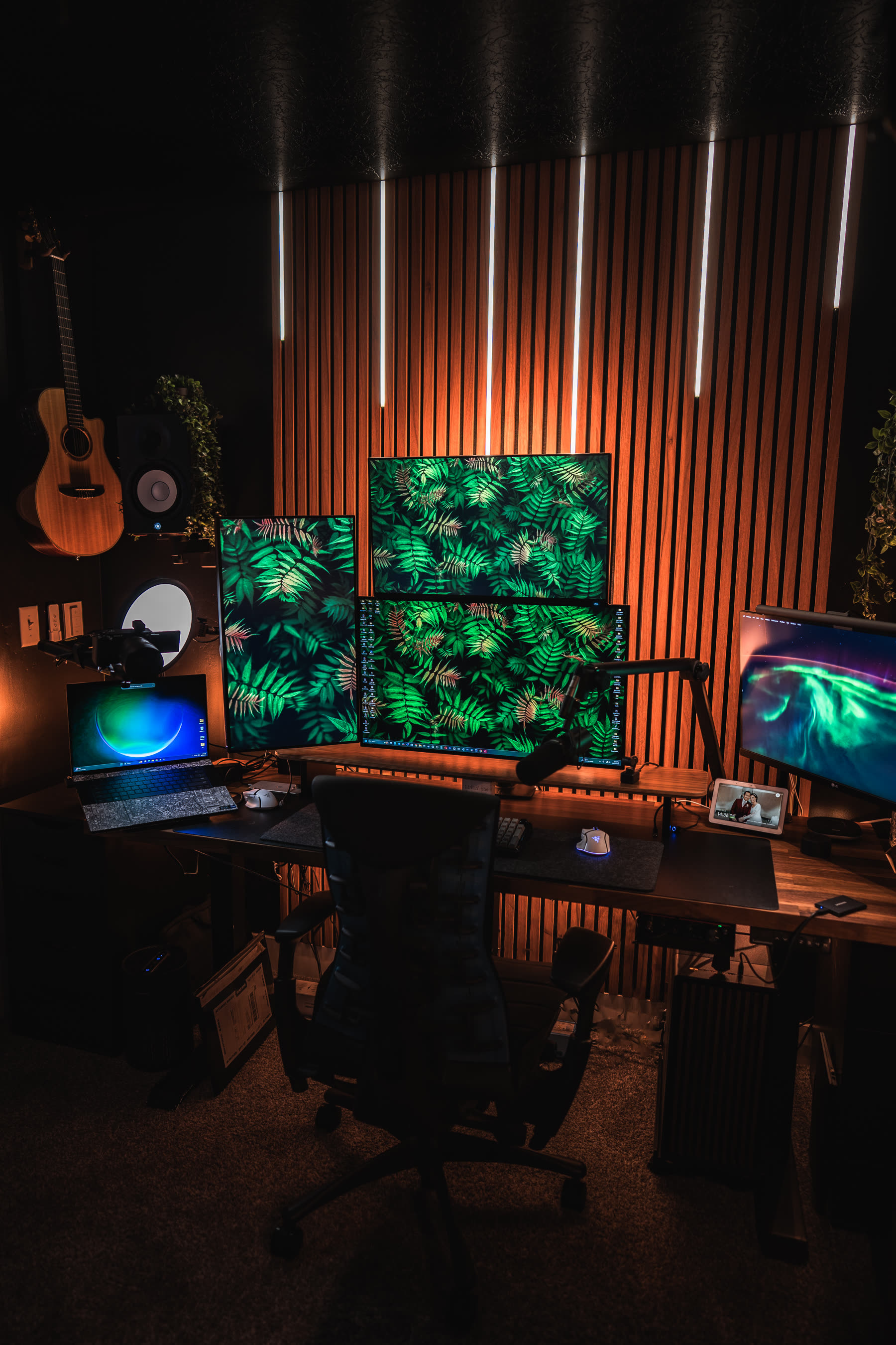 Inside the Black Note studio: edit desk, monitors, and warm slat-wall lighting